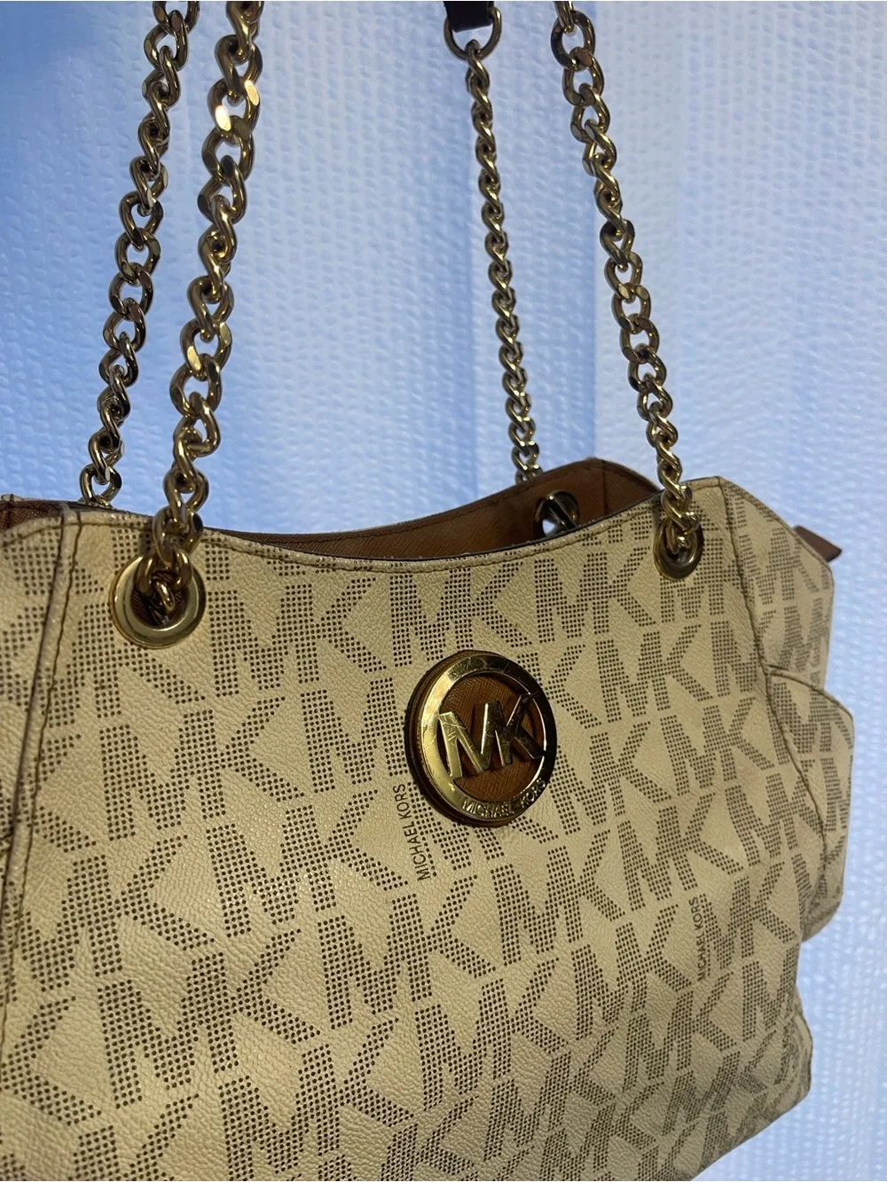 39. Rehab, Michael Kors purse.